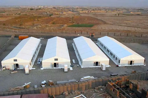 仓储蓬,临时伸缩仓库,仓库外搭棚子,钢棚,厂房雨棚,简易钢结构厂棚,建设工厂的帐篷图片